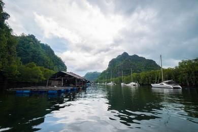 river and floating fishing village in kilim karst geoforest park at the start of our mangrove tour on langkawi