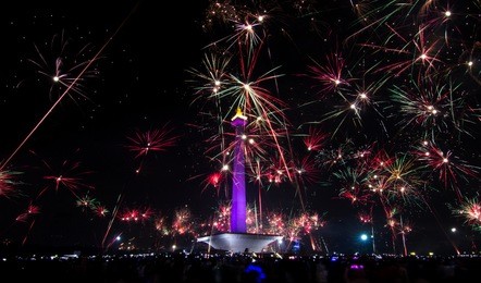 jakarta city when celebrating new year with fireworks at national monument (monas) 