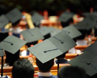 shot of graduation caps during commencement.