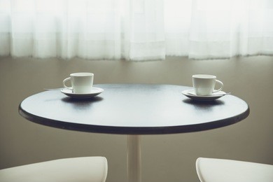 two coffee cups on table near windows morning romantic love concept