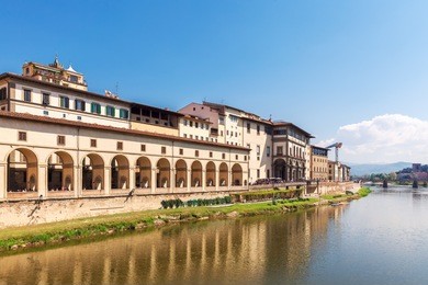 quay of the arno river and the uffizi gallery in florence, italy