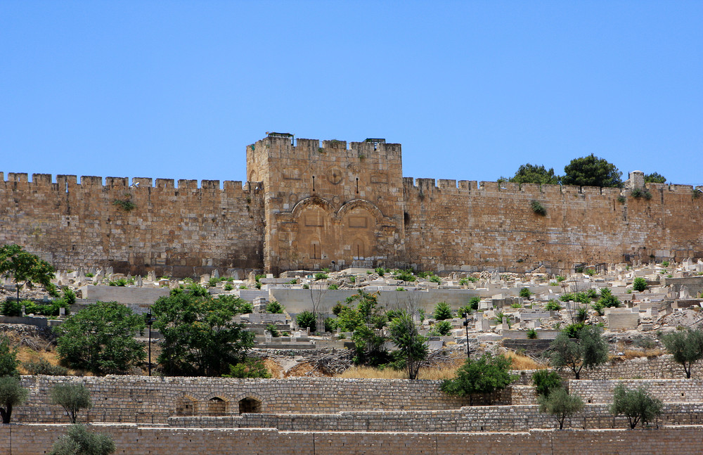 view of golden gates in jerusalem's old city walls, garden and ancient cemetery, israel
