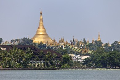 the shwedagon pagoda seen from kandawgyi lake, yangon, burma, myanmar, southeast asia