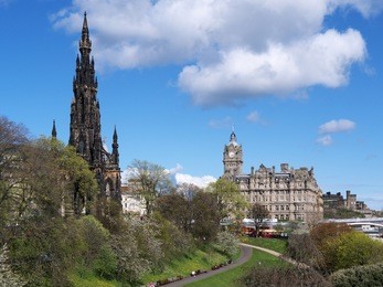princes street gardens, edinburgh, scotland, with the scott monument and the balmoral hotel