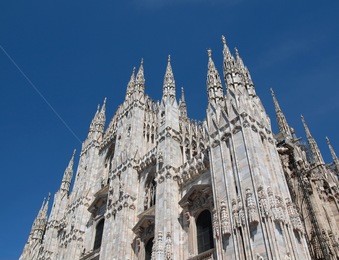 duomo di milano dom gothic cathedral church abbey milan italy italia landmark over blue sky