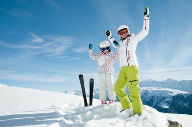 winter, ski sun and fun - family in ski resort