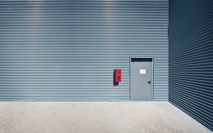 tin wall background with concrete floor.