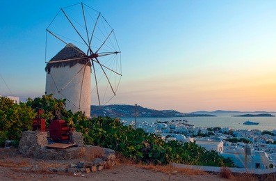 mykonos, famous windmill at sunset amazing greek islands series