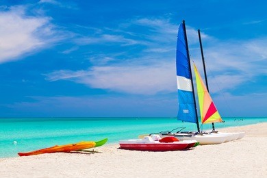 sailing boats, catamarans, kayaks and water bikes in the beautiful cuban beach of varadero