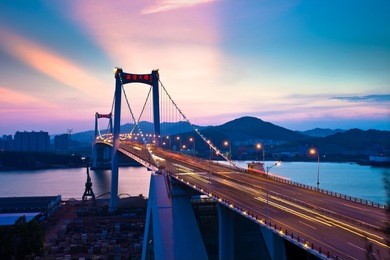 bridge over sea at night in xiamen