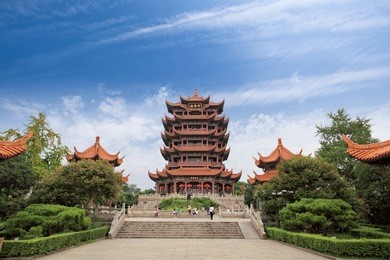 yellow crane tower against a blue sky in wuhan, china