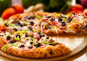 supreme pizza lifted slice