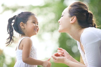 mum and daughter spending time together in the park