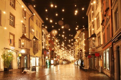 street in a christmas night in an old european town