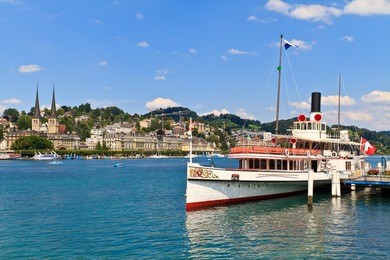 lucerne city view with steam ship, switzerland