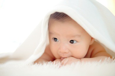 cute baby lie on bed