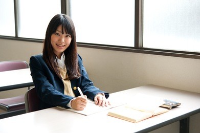asian high schoolgirl studying in classroom
