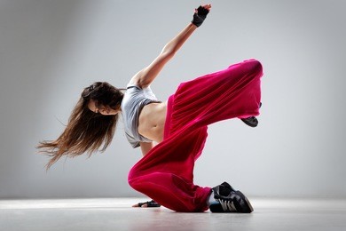 dancer posing on studio background