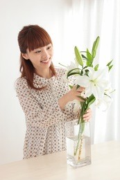 beautiful young asian woman with flowers