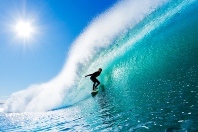 surfer on amazing blue wave