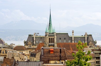 spire of st francois church above the rooftops of lausanne. canton vaud, switzerland