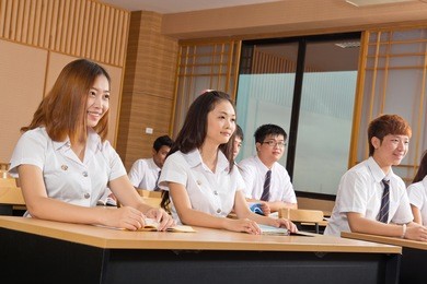 group of students study in classroom at university in thailand.