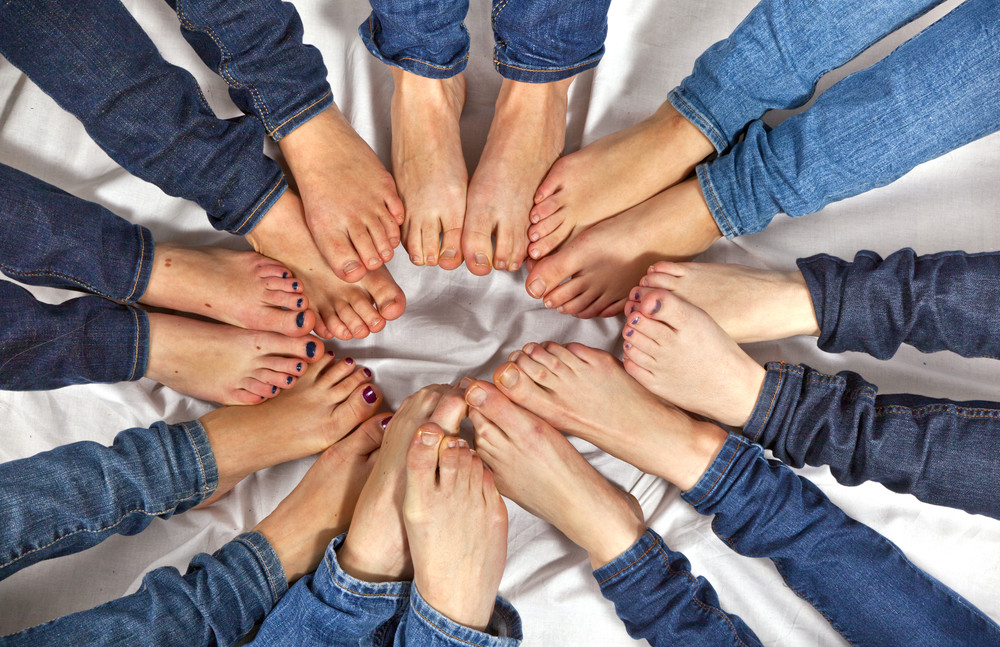 feet of girls form a circle