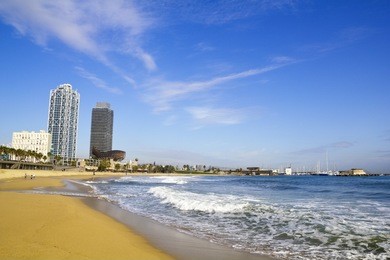 view of barcelona from the beach of barceloneta
