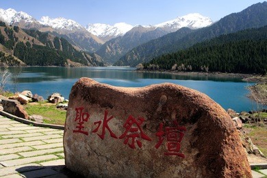 tianchi lake(heaven's lake) a beautiful lake in tianshan mountains, xinjiang, china.tianchi lake 's elevation is 1980 meters, 3.5 kilometers long, the deepest place of the lake is 103 meters.