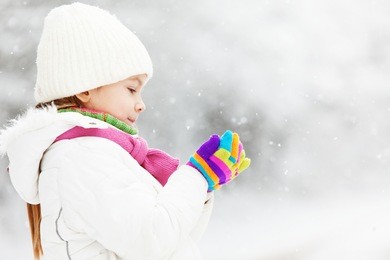 portrait of cute little girl in winter