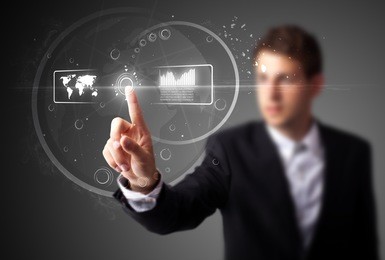 businessman pressing high tech type of modern buttons on a virtual background