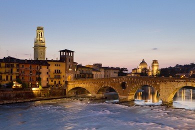 panorama of verona across adige river with ponte pietro, duomo (dome) and chiesa di san giorgio in braida