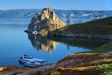 cape burhan and shaman rock on olkhon island at baikal lake, russia
