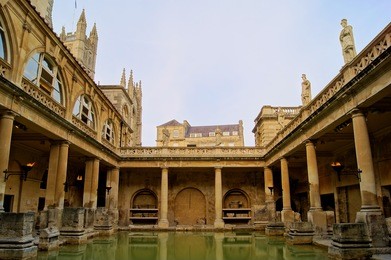 ancient roman baths of bath england at dusk
