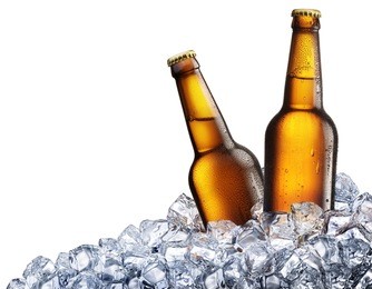 two bottles of beer on ice cubes. isolated on white background.