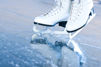 tilted blue version, ice skates with reflection