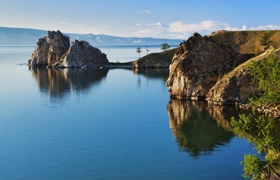cape burhan and shaman rock on olkhon island at baikal lake, russia