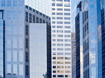 business district of a modern downtown. calgary office buildings in downtown. many oil company's headquarters are in calgary.