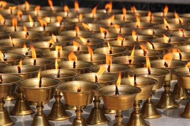 candles in buddha temple, leshan, china
