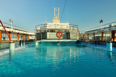 view of the cruise ship deck with luxurious pool and spa area