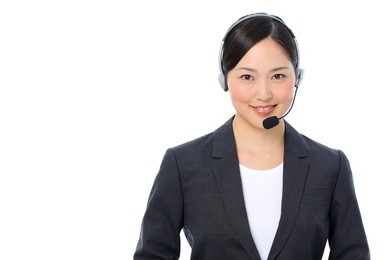 portrait of a young female customer service operator