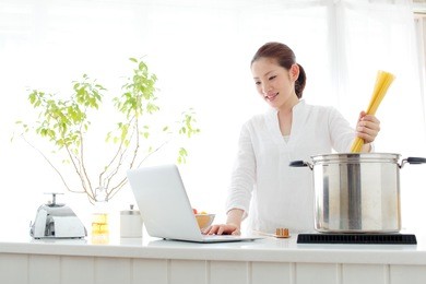 attractive asian woman in the kitchen