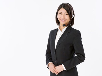 portrait of a young female customer service operator