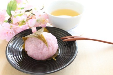 japanese confectionery, sakura mochi and green tea for dessert image