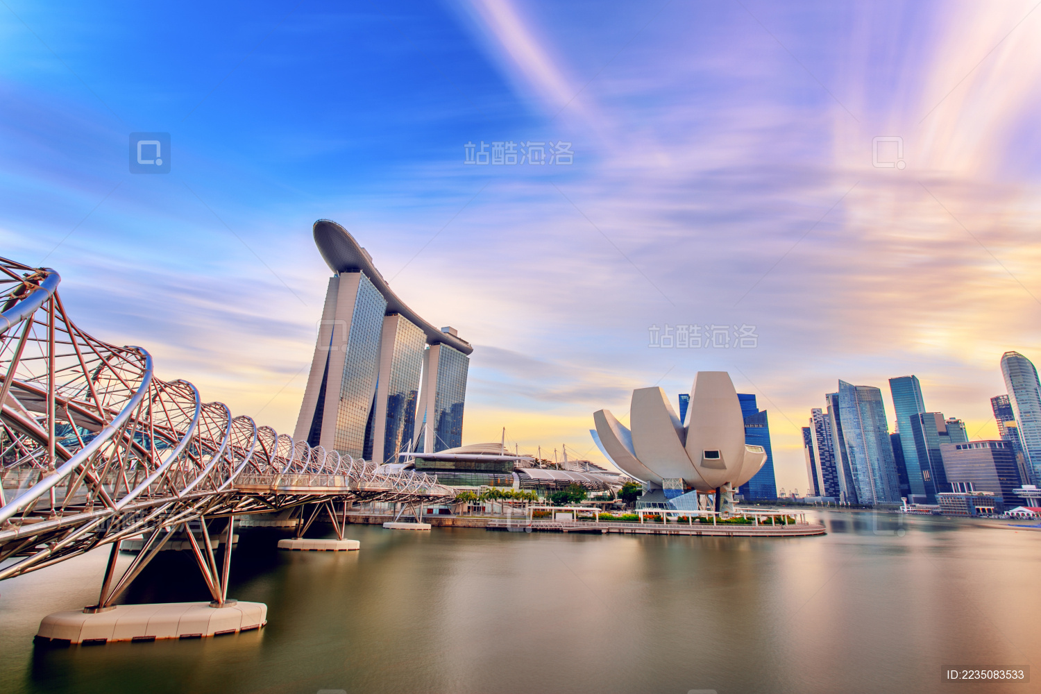 landmark modern building near river in singapore