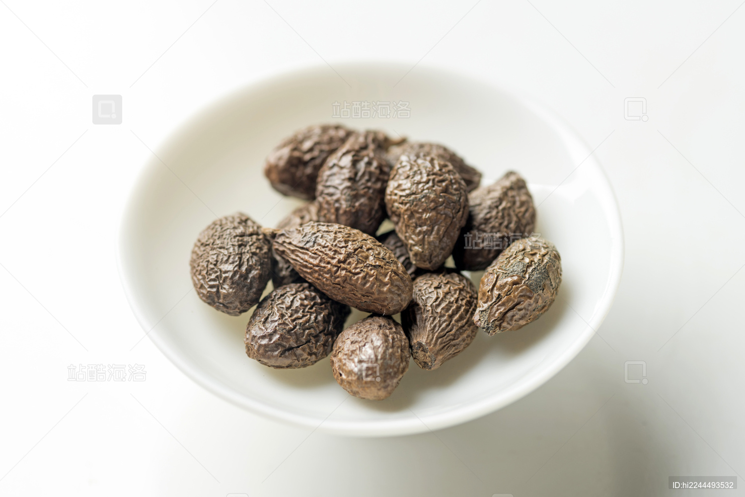 传统中药胖大海摆放在桌面上特写_站酷海洛_正版图片_视频_字体_音乐