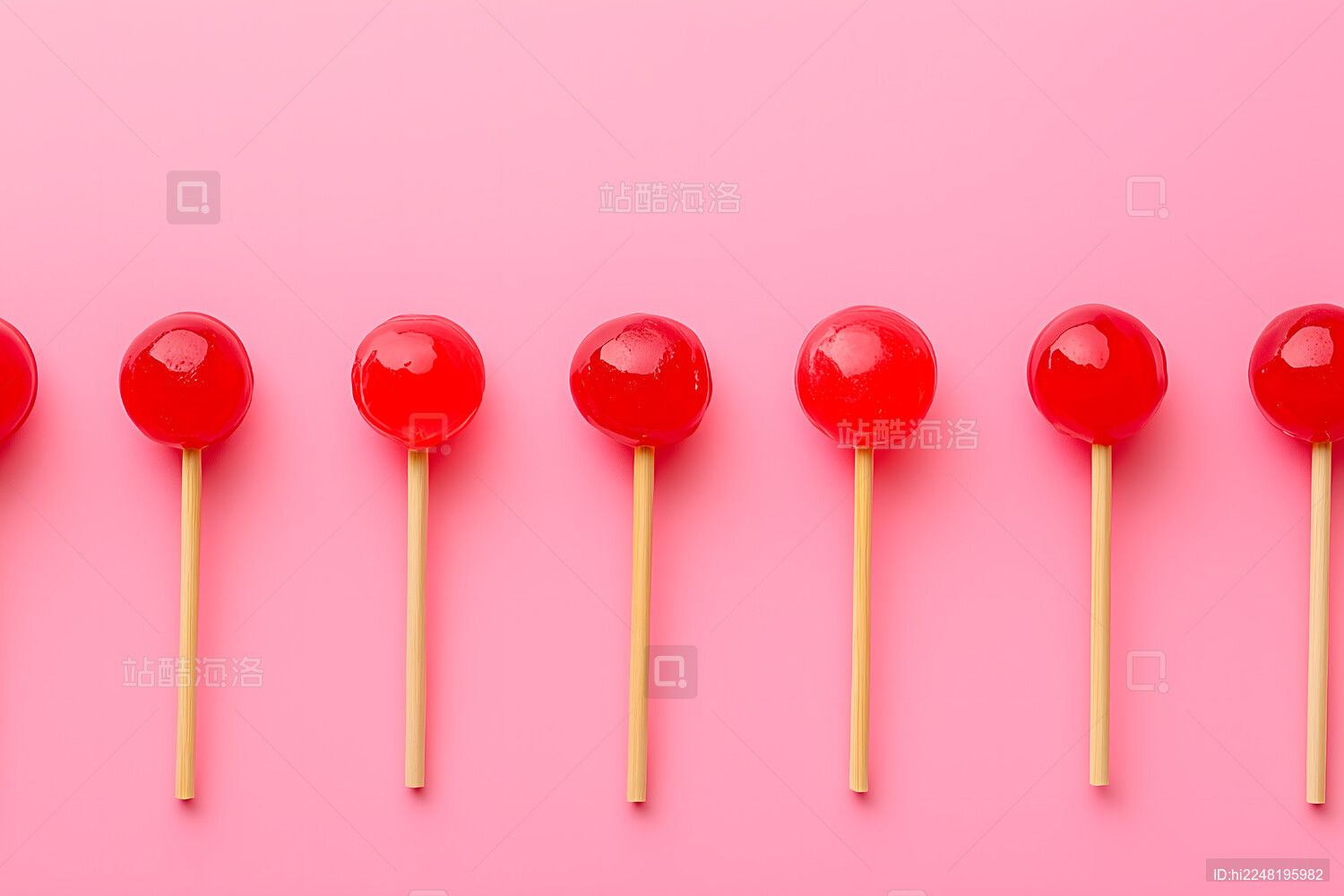 粉红色背景上的棒棒糖