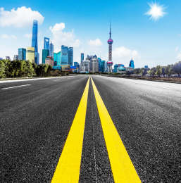 Asphalt road in front of the modern city Shanghai china