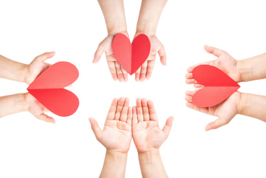 儿童双手捧着红心/奉献爱心公益概念海报
