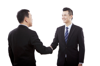 东方商人握手
